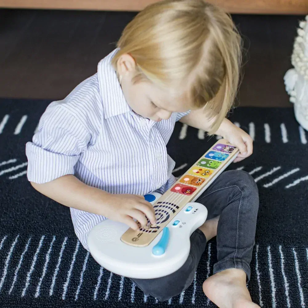 BABY EINSTEIN Kytara dotyková Strum Along Songs™ Magic Touch™ HAPE 12m+