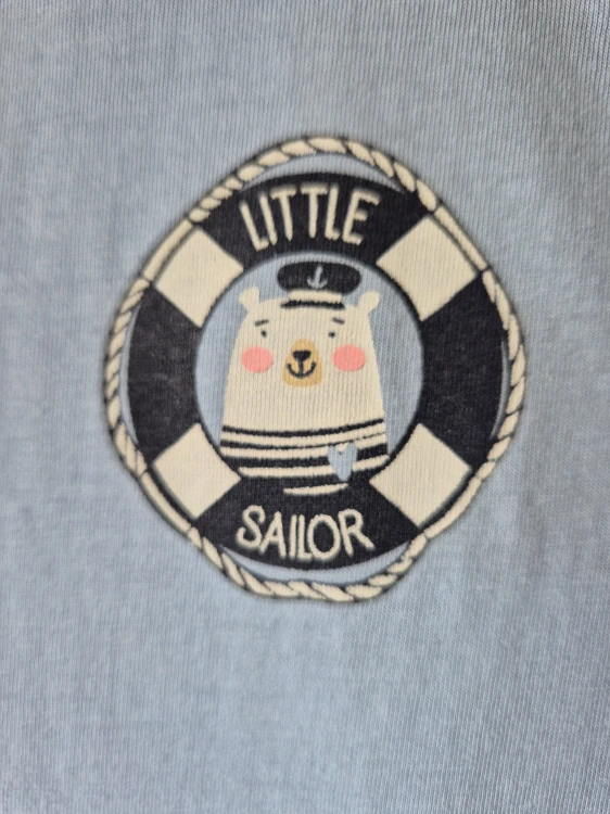 Letní bavlněný overálek Little Sailor Blue Seven 