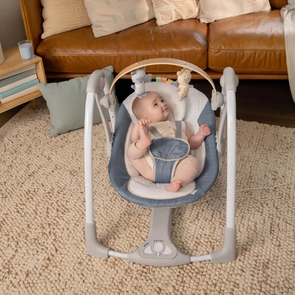 INGENUITY Houpačka konvertibilní s melodií Swing'n Go Chambray 0m+ do 9kg