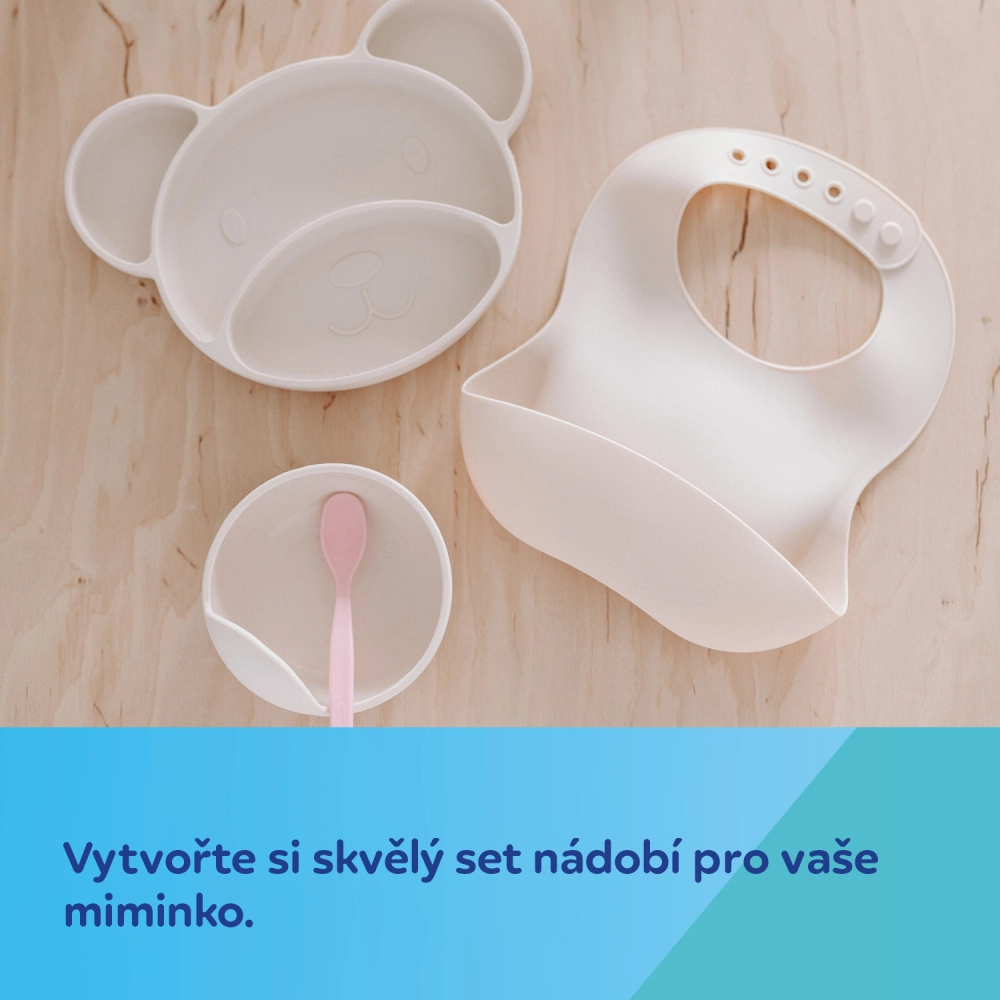 Canpol babies Silikonový bryndák s kapsou krémový