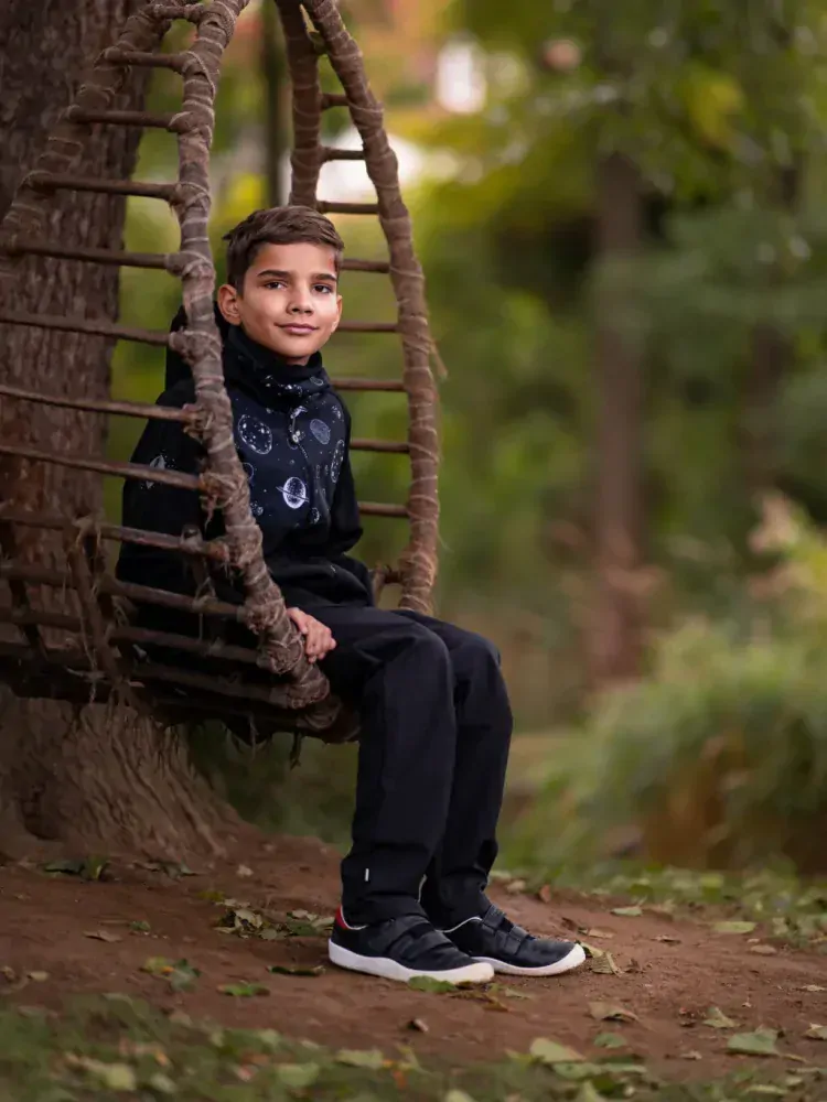 Dětské Softshellové kalhoty Unuo bez zateplení Basic, Černá velikost  104/110