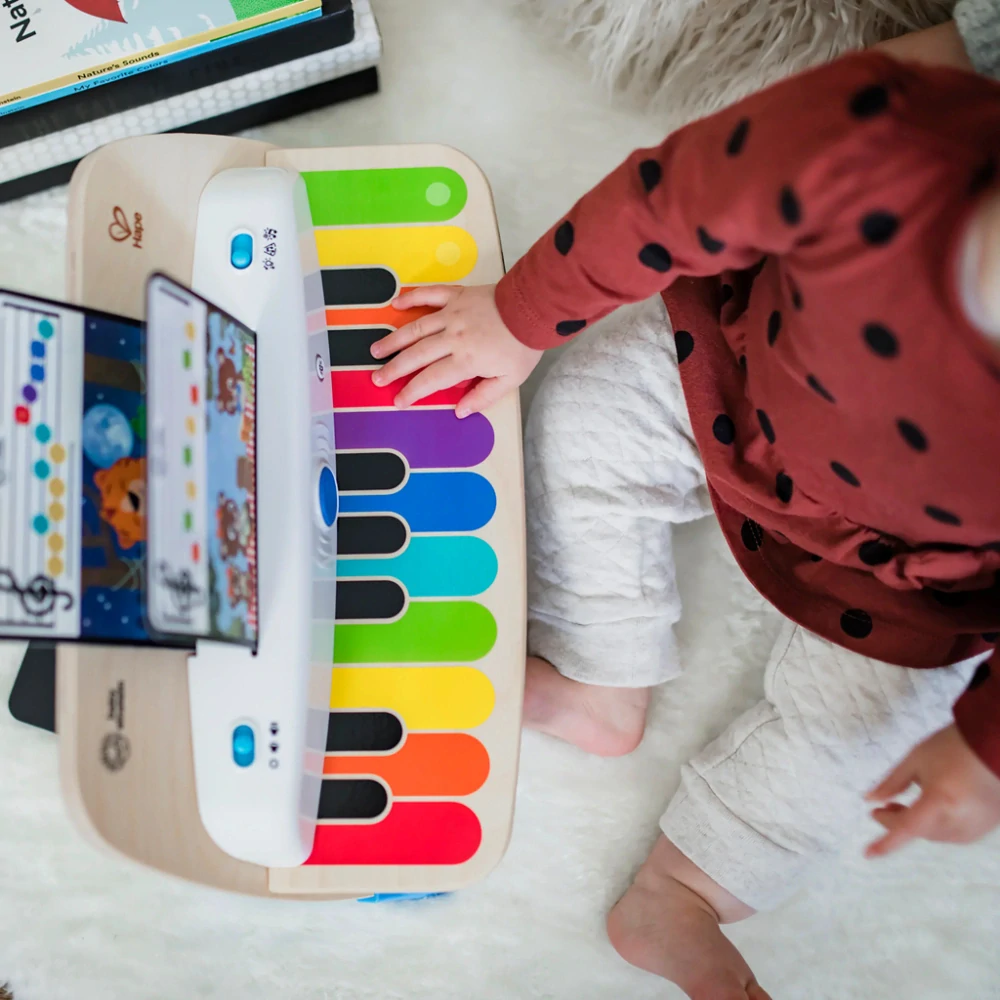 BABY EINSTEIN Hračka dřevěná hudební piano Together in Tune Piano Connected Magic Touch HAPE 12m+
